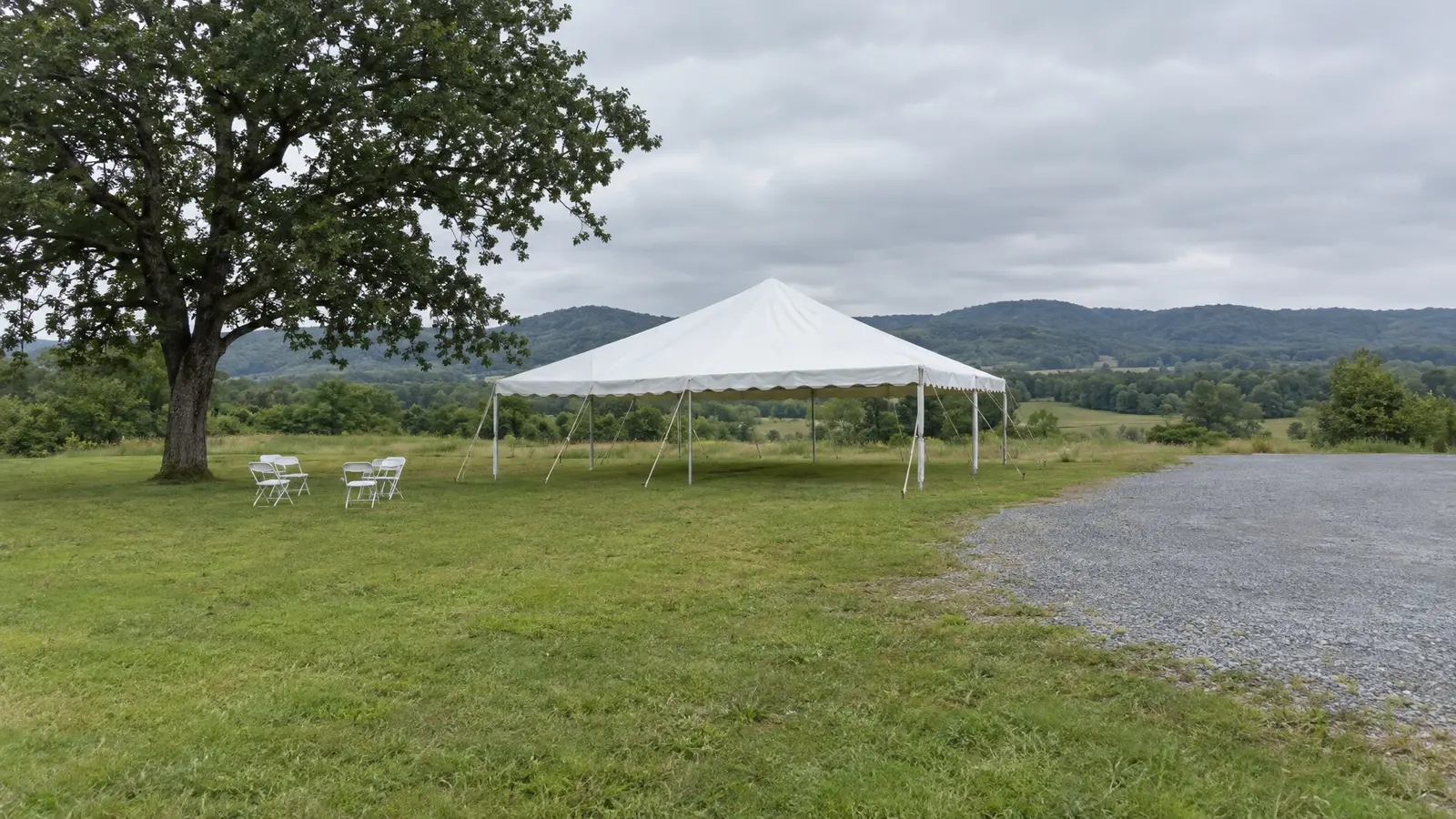 Before: an open field with a plain party tent