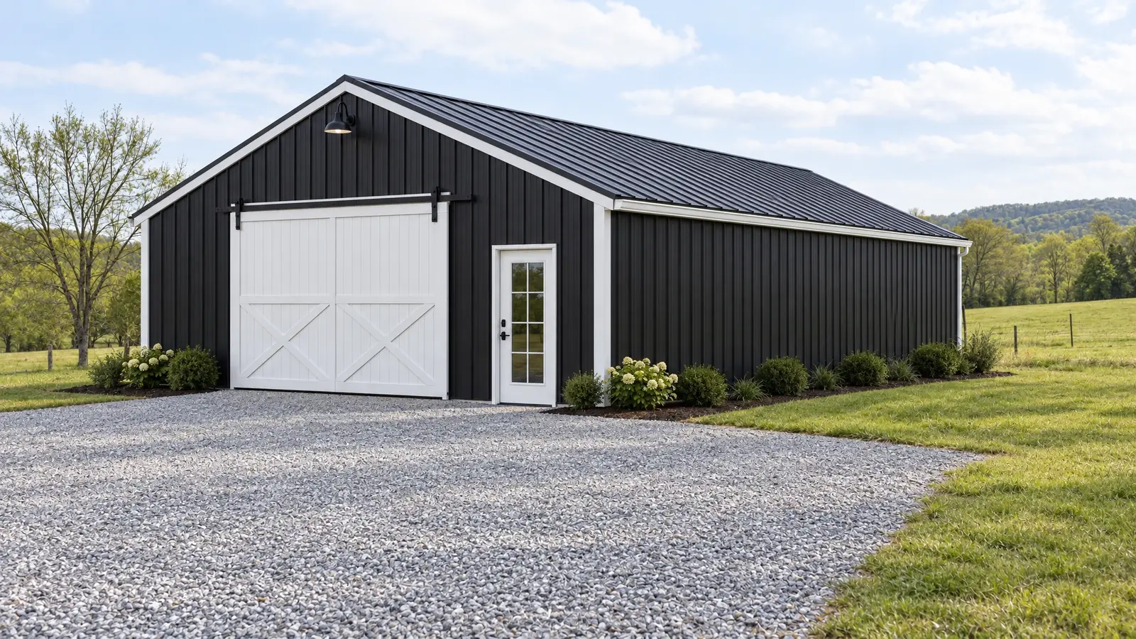 After: Barn facelift | Music City Barns After: a dated metal barn with black siding, a new standing seam roof and white trim