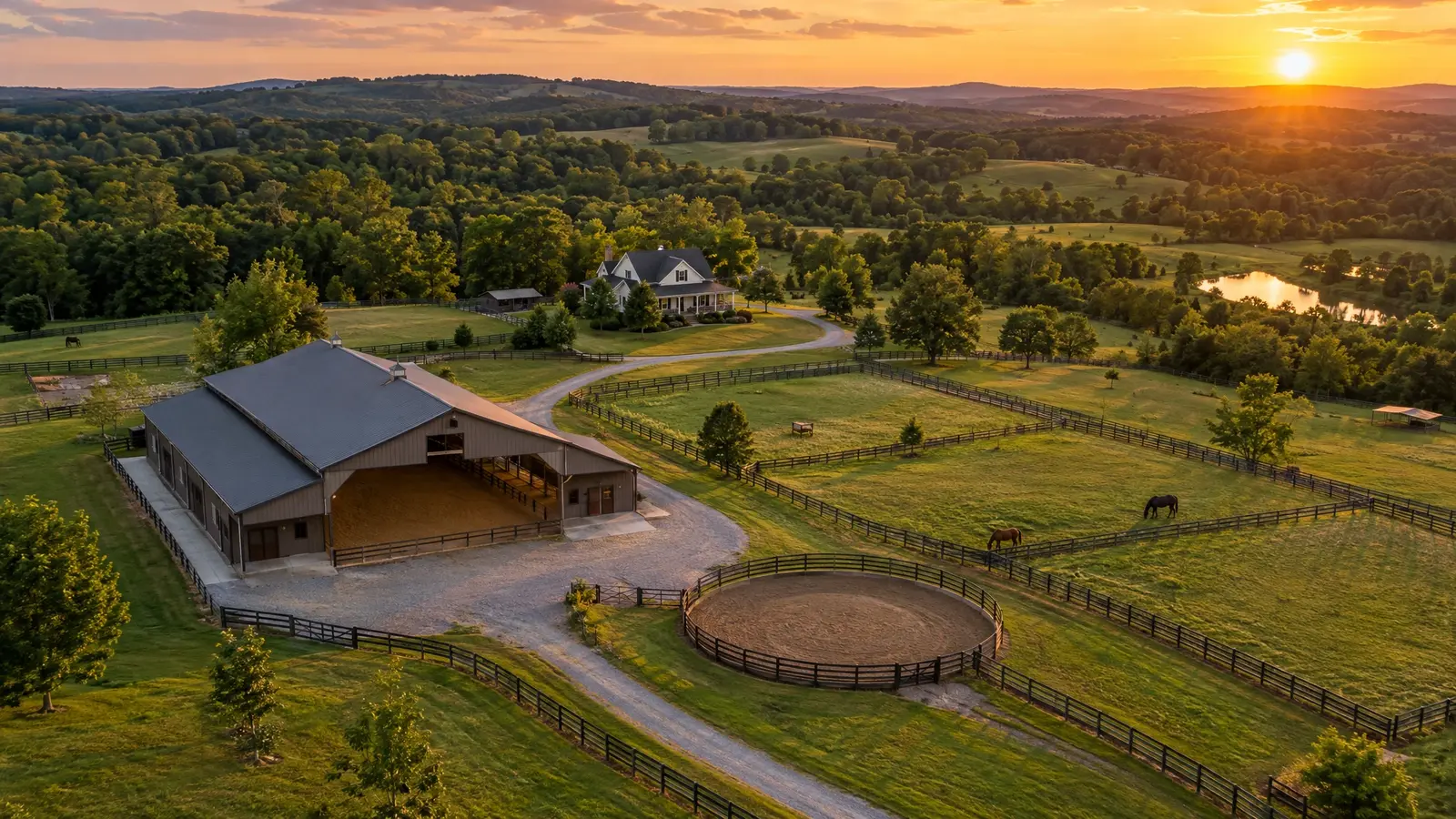 An aerial view of a horse property with a barn, arena and paddocks An aerial view of a horse property with a barn, arena and paddocks